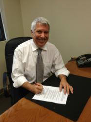 Dave Neal Signing Code of Fair Campaign Practices